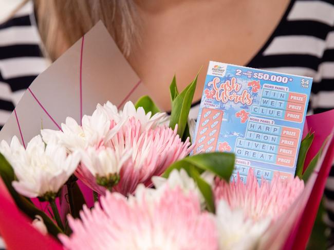 Regional Qld mother celebrates massive scratchy Lotto win