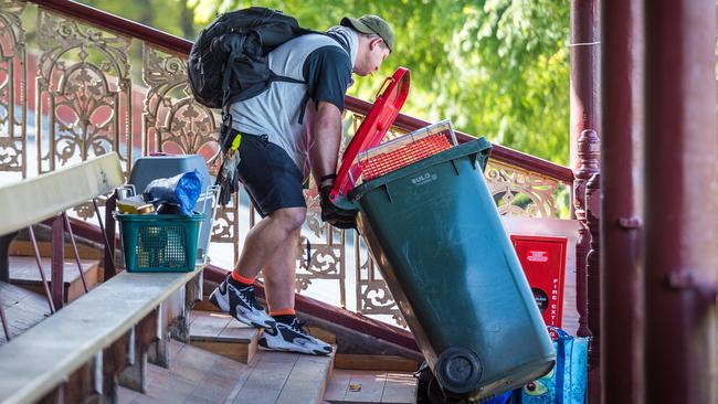 Squatter Mitch Turner removes his items from his camp. Picture: Jake Nowakowski