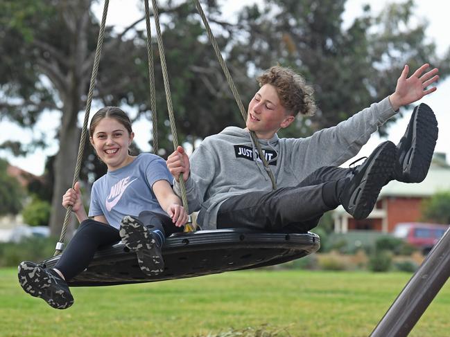 27/08/20 - Noah, 14, and Alana, 12, keeping active at Torrens Reserve in Flinders Park.Picture: Tom Huntley