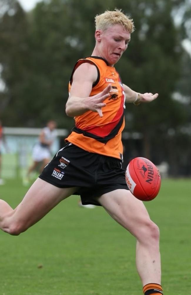 Cooper Herbert takes a kick for the Calder Cannons