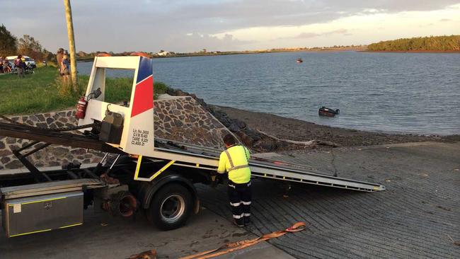 A car is pulled from the Fairymead Boat Ramp.