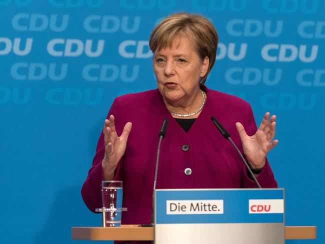 German Chancellor and leader of the Christian Democratic Union (CDU) Angela Merkel speaks during a press conference at the CDU headquarters on October 29, 2018 one day after the regional state elections in Hesse. - German Chancellor Angela Merkel announced she will not stand again as leader of her centre-right CDU, which she has chaired the CDU for 18 years, and step down as German chancellor when her mandate ends in 2021, making way for a successor following a series of regional vote defeats. (Photo by Markus HEINE / AFP)