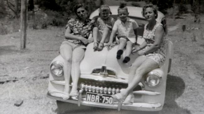 Joan Doherty (left) with her kids Sue-Ellen and Mark and Mrs Petrov on their Gold Coast holiday.