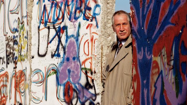 East-German spymaster Markus Wolf at the Berlin Wall. Picture: Getty Images