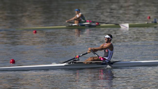 A rower from Turkey participates in the World Junior Rowing Championships on Rodrigo de Freitas lake.