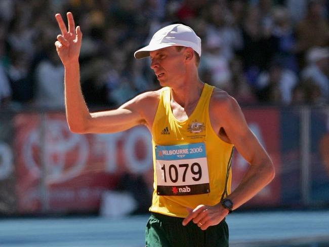 MELBOURNE, AUSTRALIA - MARCH 19: Scott Westcott of Australia competes in the final of the men's marathon at the athletics during day four of the Melbourne 2006 Commonwealth Games at the Melbourne Cricket Ground on March 19, 2006 in Melbourne, Australia. Samson Ramadhani Nyoni of Tanzania won gold, Fred Mogaka Tumbo of Kenya won silver and Daniel Robertson of England won bronze. (Photo by Mark Dadswell/Getty Images)