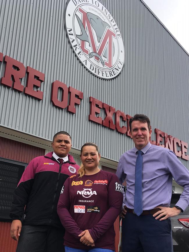 Tesi Niu's younger brother Pulete, mother Lesieli and Marsden SHS principal Andrew Peach at the Marsden’s Centre of Excellence.