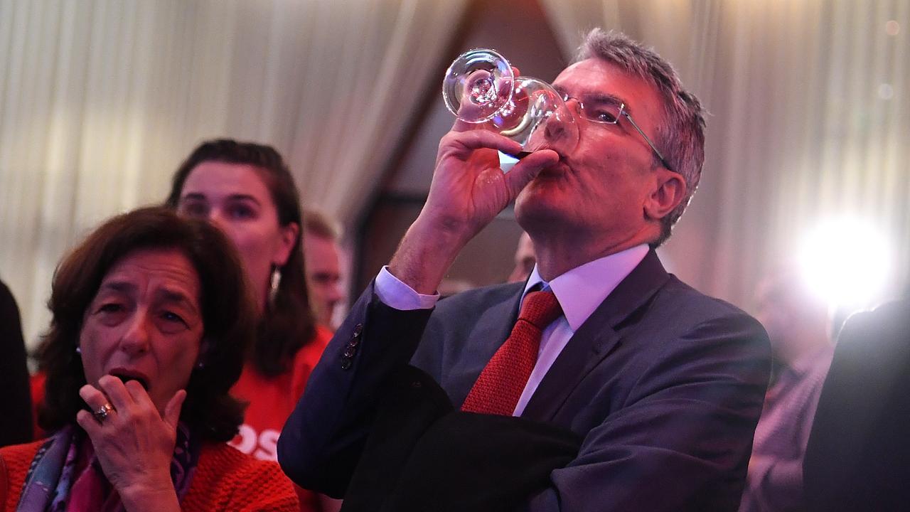 Mark Dreyfus is seen alongside Labor supporters during the count. Picture: Lukas Coch