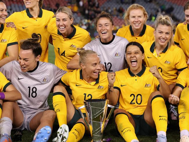 NEWCASTLE, AUSTRALIA - FEBRUARY 22: Sam Kerr of the Matildas signs celebrates with team mates after winning the Cup of Nations match between the Australia Matildas and Jamaica at McDonald Jones Stadium on February 22, 2023 in Newcastle, Australia. (Photo by Cameron Spencer/Getty Images)