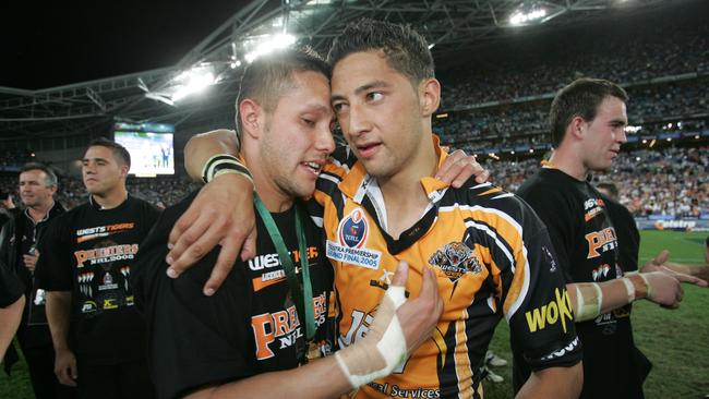 Scott Prince and Benji Marshall celebrate their grand final win.