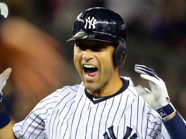 NEW YORK, NY - SEPTEMBER 25: Derek Jeter #2 of the New York Yankees celebrates after a game winning RBI hit in the ninth inning against the Baltimore Orioles in his last game ever at Yankee Stadium on September 25, 2014 in the Bronx borough of New York City. Al Bello/Getty Images/AFP == FOR NEWSPAPERS, INTERNET, TELCOS & TELEVISION USE ONLY ==