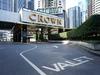 Crown axes dividend after profit plunge