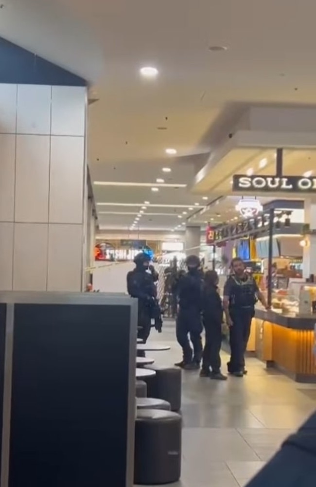 Heavily armed police swarm the food court following the stabbing. Picture: Instagram via @This.is_Melbourne