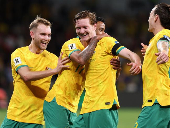 SYDNEY, AUSTRALIA - MARCH 21: Kye Rowles of Australia celebrates scoring a goal with team mates during the FIFA World Cup 2026 Qualifier match between Australia Socceroos and Lebanon at CommBank Stadium on March 21, 2024 in Sydney, Australia. (Photo by Cameron Spencer/Getty Images)