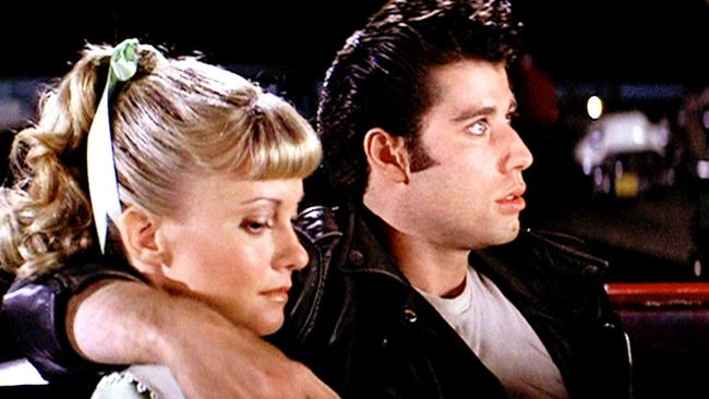 The movie <i>Grease</i>, released in 1978, featured a scene with Danny Zuko (John Travolta) and Sandy (Olivia Newton-John) on date at a drive-in cinema. Picture: Paramount Pictures