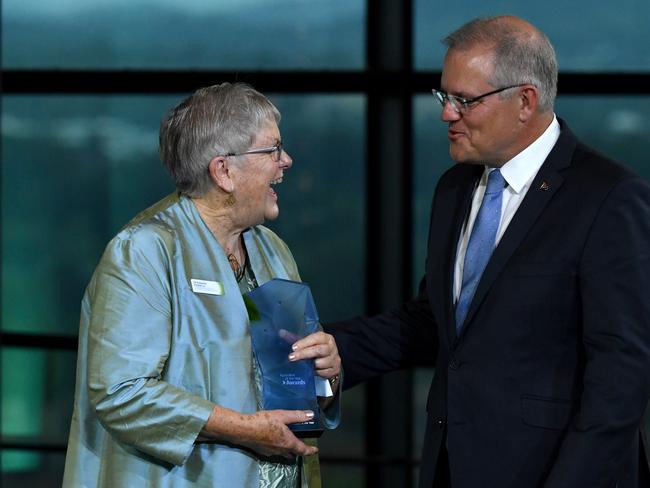 Prime Minister Scott Morrison with winner 2019 Senior Australian of the Year Dr Suzanne Packer. Picture: AAP