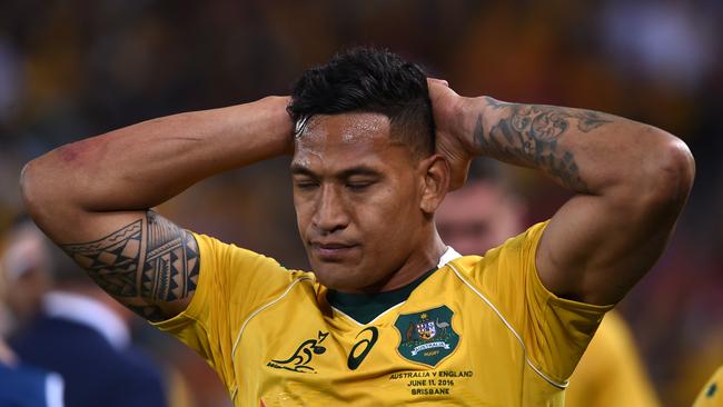 Wallabies player Israel Folau reacts following the First Test between the Australia Wallabies and the England Roses at Suncorp Stadium in Brisbane, Saturday, June 11, 2016. (AAP Image/Dave Hunt) NO ARCHIVING, EDITORIAL USE ONLY