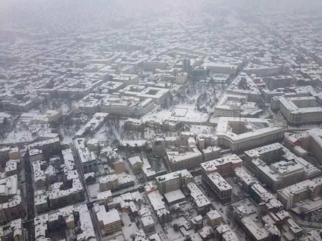 An aerial picture taken on February 26, 2018 shows snow-covered buildings in Sofia. A wave of Siberian cold settled February 26 on the European continent, already contributing to at least nine deaths. Picture: AFP