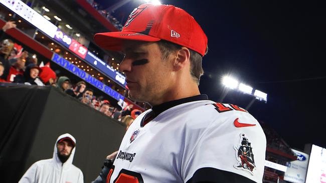 TAMPA, FLORIDA - JANUARY 23: Tom Brady #12 of the Tampa Bay Buccaneers reacts after being defeated by the Los Angeles Rams 30-27 in the NFC Divisional Playoff game at Raymond James Stadium on January 23, 2022 in Tampa, Florida. (Photo by Mike Ehrmann/Getty Images)