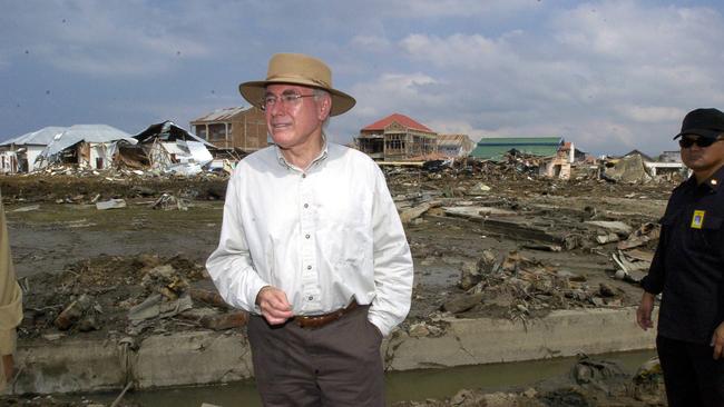 Then prime minister John Howard visiting disaster-hit Banda Aceh in Indonesia in February 2005. Picture: Kym Smith