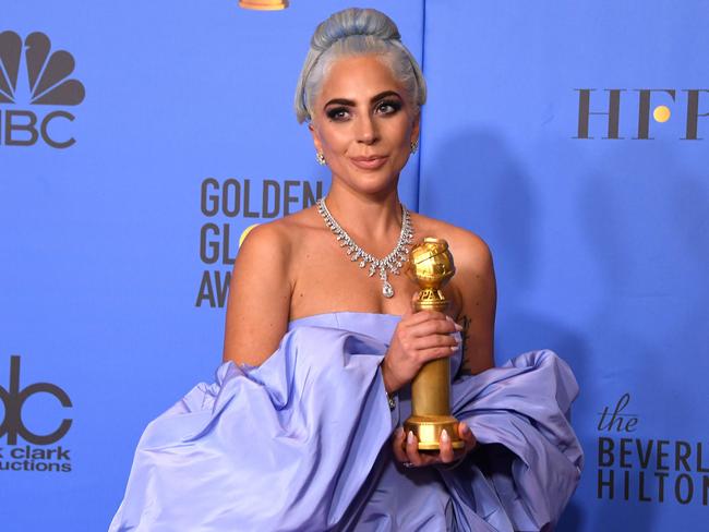 Lady Gaga with the Golden Globe for Best Original Song - Motion Picture for Shallow. Picture: AFP 