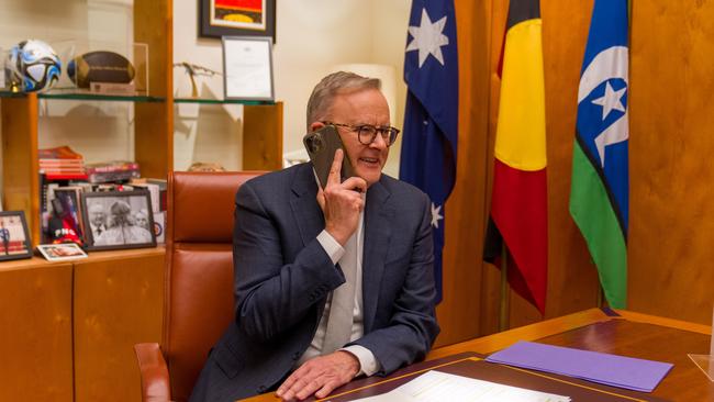 Anthony Albanese on the phone welcoming Julian Assange home. Picture: Prime Minister’s Office