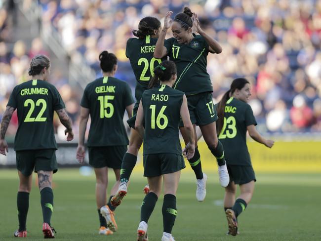 Australia forward Sam Kerr (20) celebrates her goal with her teammate Kyah Simon (17) during the second half against Japan in a Tournament of Nations soccer match Thursday, Aug. 2, 2018, in Bridgeview, Ill. (AP Photo/Annie Rice)