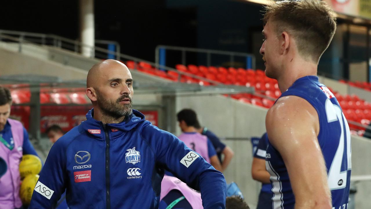 Former coach Rhyce Shaw talks to now-delisted Kangaroo Sam Durdin this year. Picture: Michael Klein