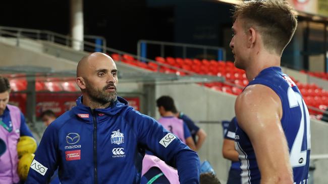 Former coach Rhyce Shaw talks to now-delisted Kangaroo Sam Durdin this year. Picture: Michael Klein