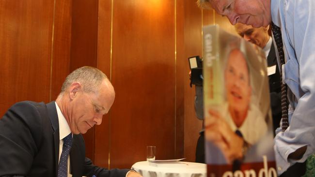 Campbell Newman signs his new book. Photo: Steve Pohlner