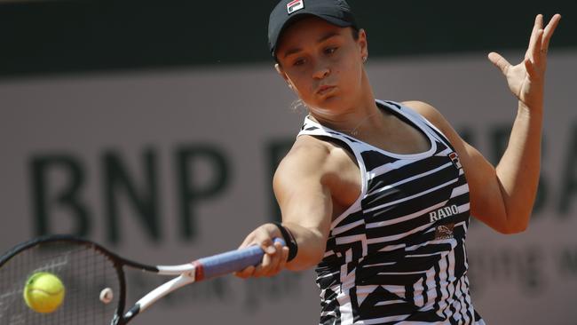 Ash Barty hits a return to Madison Keys on her way to a straight sets quarter-final win. Picture: AP