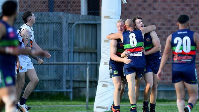 The Northern Saints celebrate after kicking a goal. (Photo by Josh Chadwick)