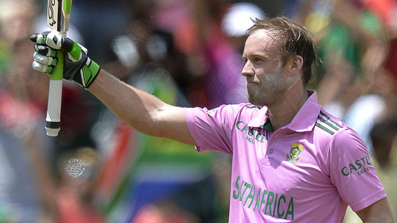 South African batsman AB de Villiers celebrates scoring a century (100 runs) during the second One Day International cricket match between South Africa and the West Indies at Wanderers cricket ground in Johannesburg on January 18, 2015. AFP PHOTO / STRINGER =RESTRICTED TO EDITORIAL USE=