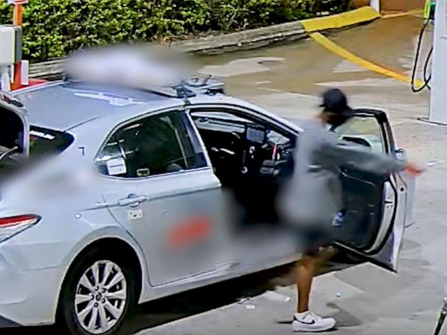 Watch: Police hunt knifeman after taxi driver robbed at servo