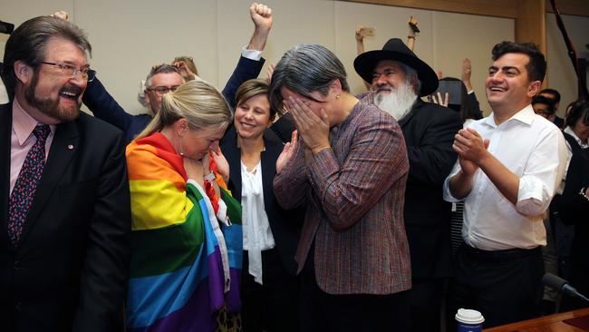 Penny Wong weeps as other senators celebrate the Yes verdict from Australian voters. Picture: Gary Ramage