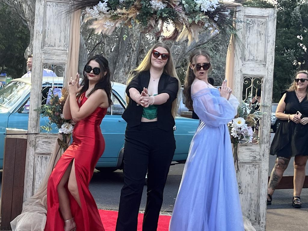 Kobie Zahl, Riley Popp and Shelby Anderson arrive at the Hervey Bay State High School formal.