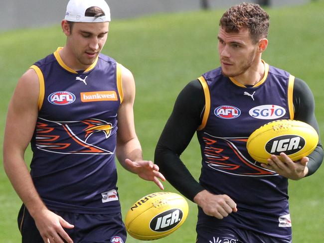 West Coast Eagles AFL players (L-R) Francis Watson, Elliot Yeo and Luke Shuey take part in an open training session at Domain Stadium in Perth, Monday, September, 11, 2017. The West Coast Eagles will play Greater Western Sydney in the first semi finals on Saturday. (AAP Image/Richard Wainwright) NO ARCHIVING