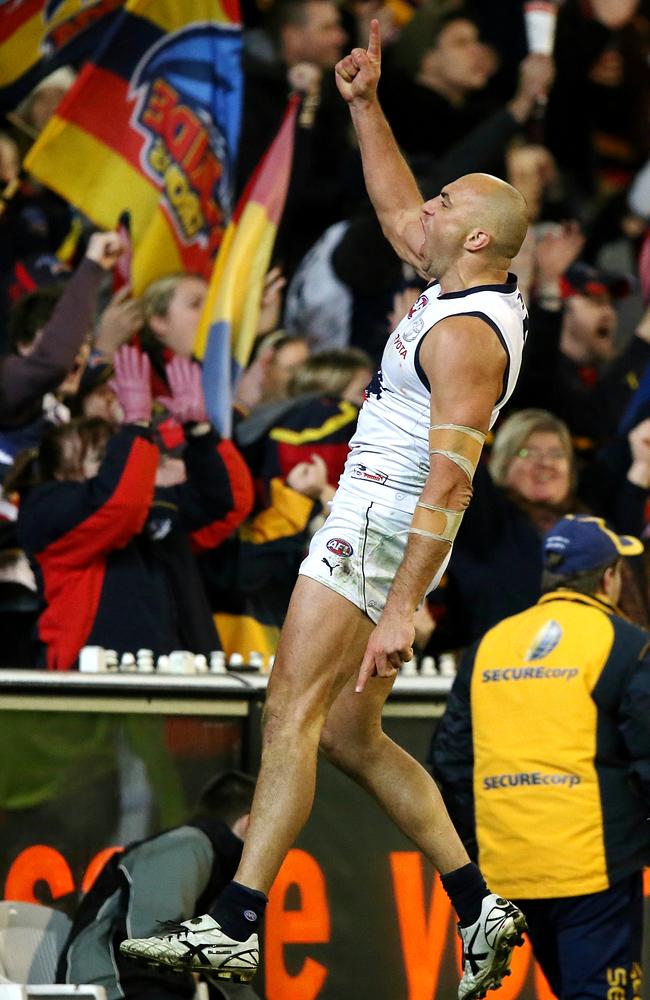 Crow James Podsiadly celebrates a critical goal in the last quarter. Picture: Wayne Ludbey