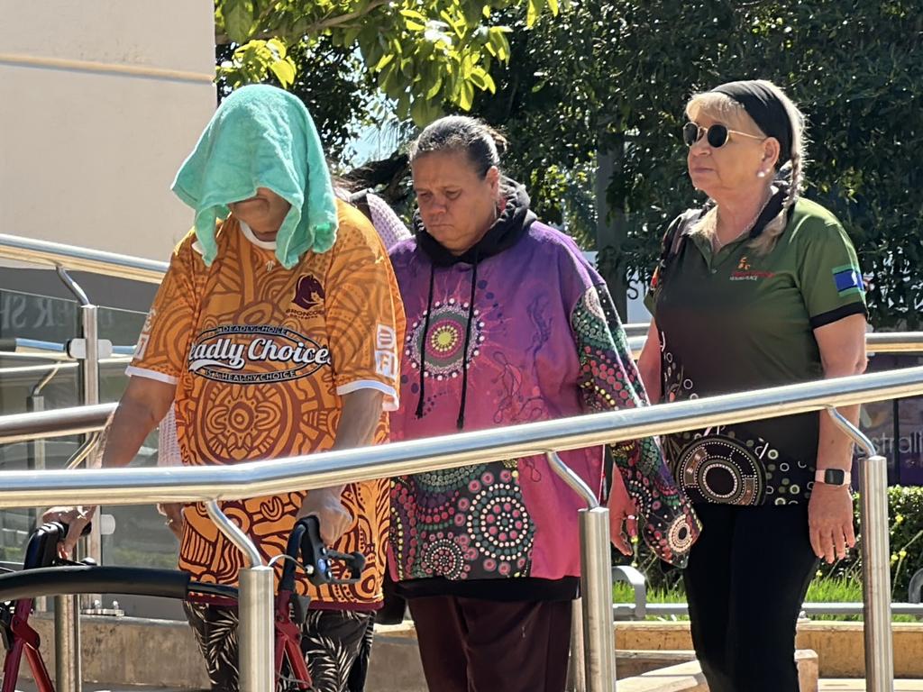 Gwenda Lee Brown (in pink and purple top) leaves Rockhampton courthouse with supporters after receiving a suspended prison term for manslaughter. She fatally stabbed her partner, Bevan Watson, at their Blackwater home in 2018.