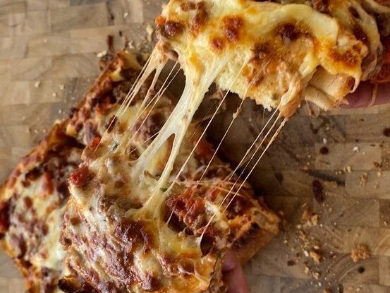 Garlic bread pizza. Use up your leftover bolognese sauce. Taste.com.au