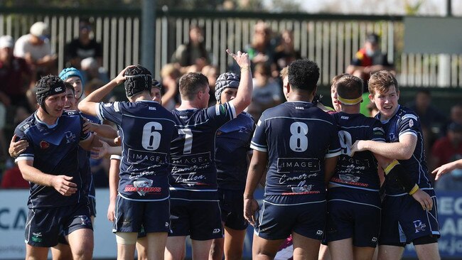 The 2021 Redcliffe SHS side celebrate a Gee Cup grand final try.