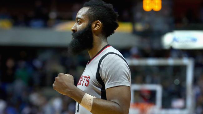 James Harden of the Houston Rockets reacts against the Dallas Mavericks in the fourth quarter.