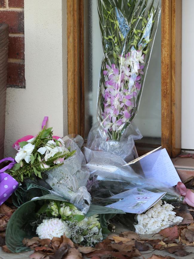 Flowers outside Ann Marie Smith’s home at Kensington Park. Picture: Dean Martin