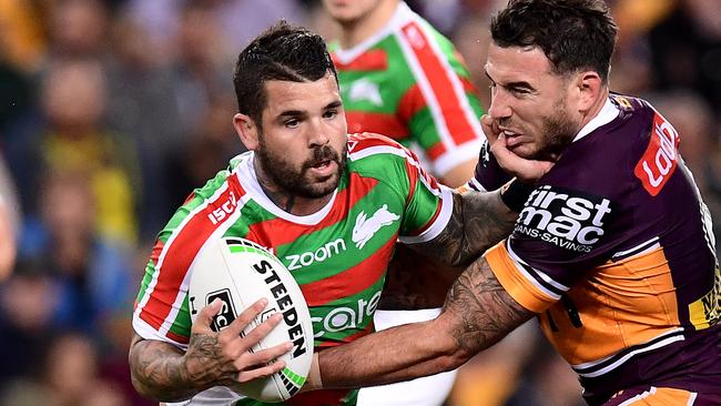 BRISBANE, AUSTRALIA – AUGUST 23: Adam Reynolds of the Rabbitohs is tackled by Darius Boyd of the Broncos during the round 23 NRL match between the Brisbane Broncos and the South Sydney Rabbitohs at Suncorp Stadium on August 23, 2019 in Brisbane, Australia. (Photo by Bradley Kanaris/Getty Images)