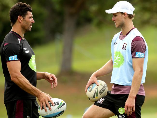 Coach Trent Barrett talks to Daly Cherry-Evans during a Manly training session. Picture Gregg Porteous