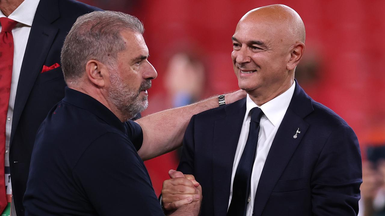Daniel Levy (right) is understood to be conflicted about whether to keep or sack Ange Postecoglou (left). (Photo by Ryan Pierse/Getty Images)