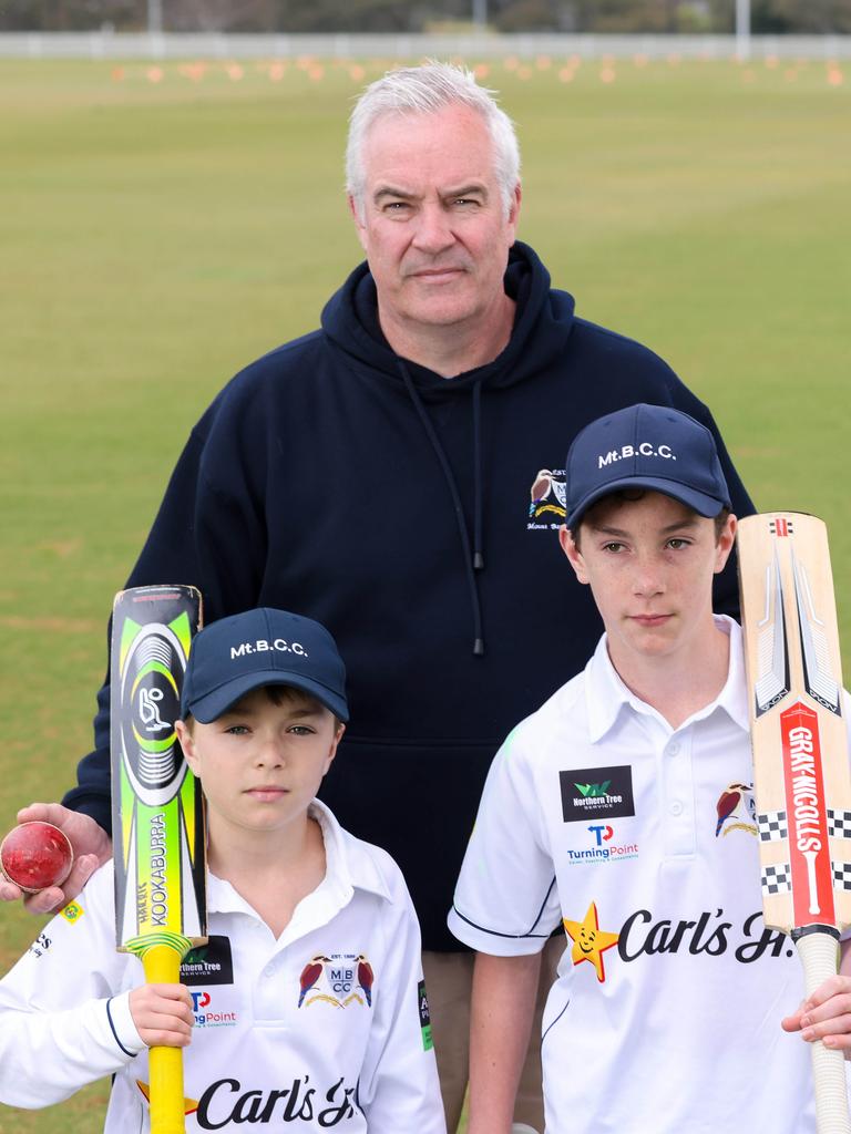 Gregg Harris with his sons George, 10, and Ted, 11, at The Summit Sport and Recreation Park Oval. Picture: Russell Millard Photography