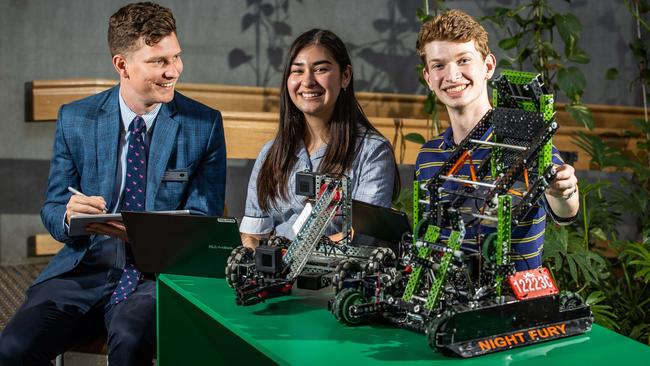 Pembroke IT teacher Sam Porter with year 12 students Sofiya Karimov and Stuart Vass. Picture: Tom Huntley