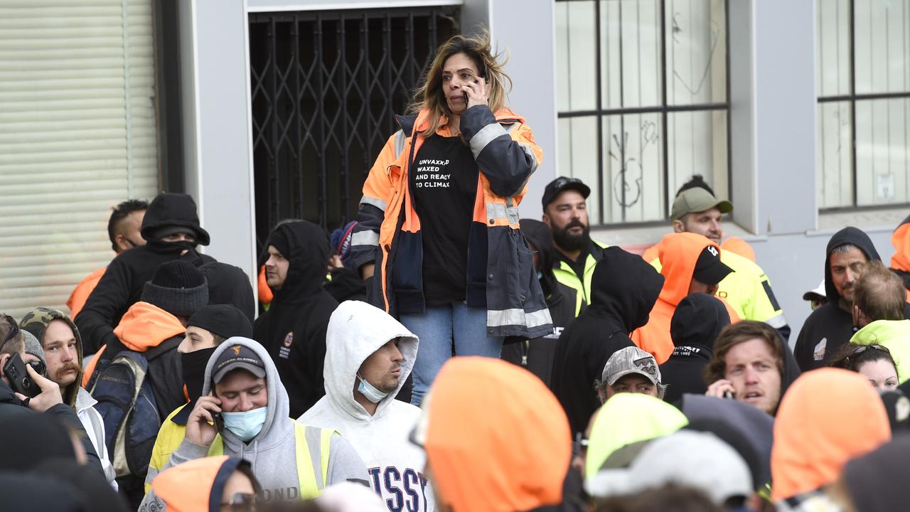 Construction workers gathered outside the CFMEU offices in Melbourne.. Picture: NCA NewsWire / Andrew Henshaw