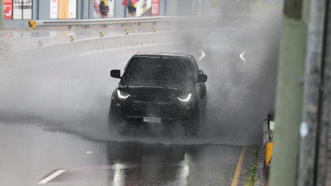 Wet weather on Parramatta Road in Sydney today. Near Haberfield.. Picture: Rohan Kelly